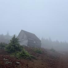 Near the top, a garage/warming hut