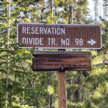 Trailhead sign from access road